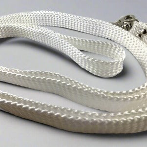 Detailed shot of nylon webbing horse reins, featuring a soft texture and strong, reinforced stitching for durability. Suitable for regular use in training and leisure rides