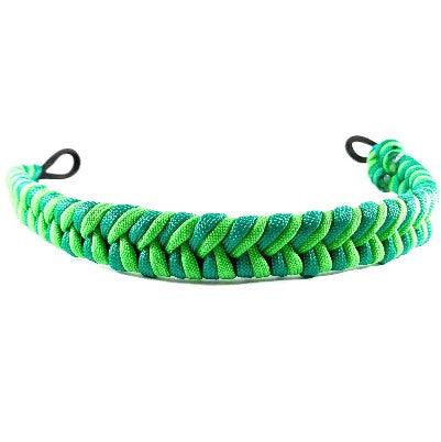 Fishtail paracord browbands from L'Equino Essentials, meticulously handcrafted with vibrant colors and intricate weaving patterns, designed to enhance the style and functionality of equestrian attire with artisanal flair and durability.